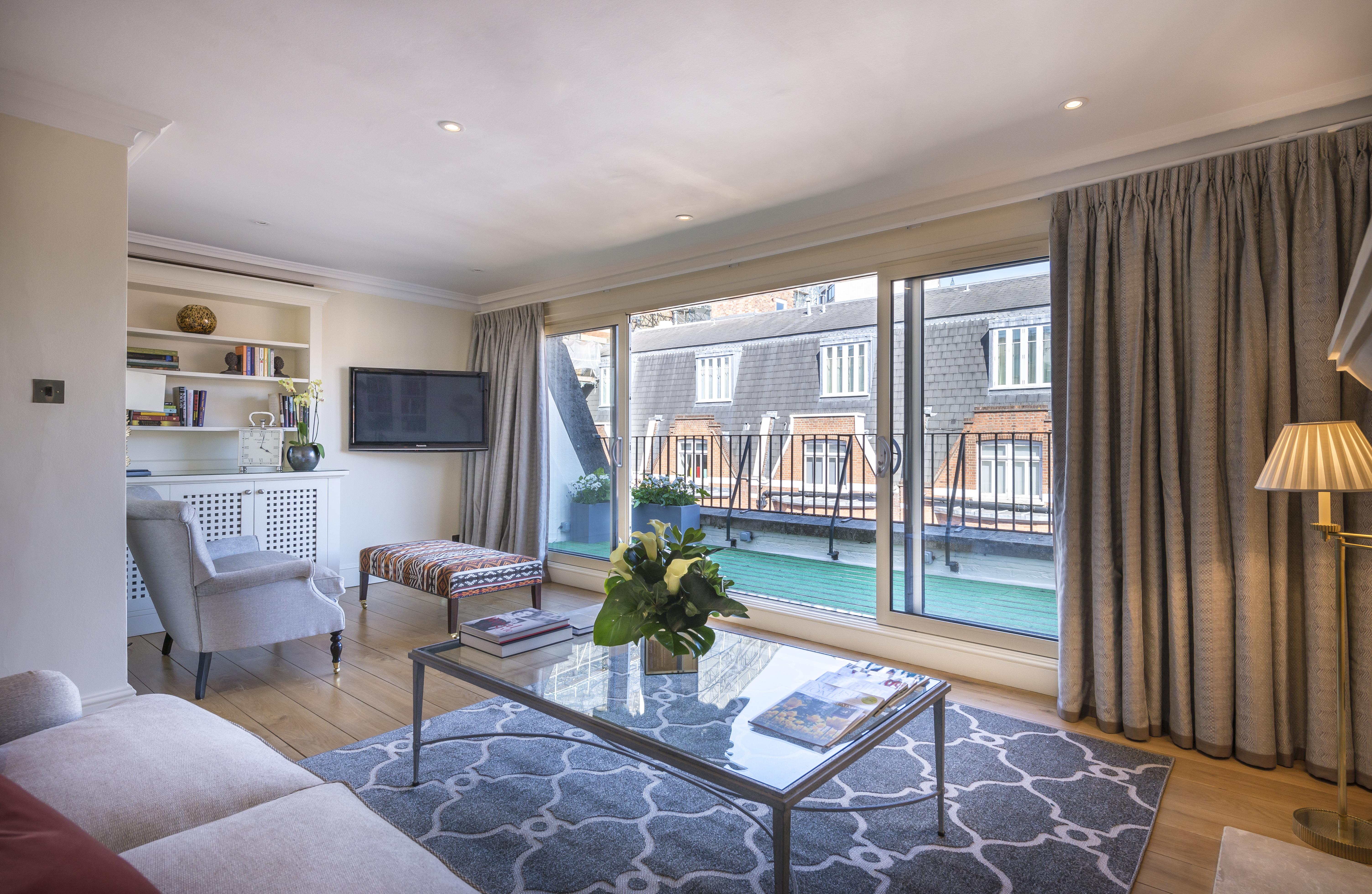 The Capital Hotel, Apartments & Townhouse London Kültér fotó A living room at the hotel